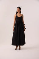 Vestido midi preto com corpo corselet e saia rodada em tecido corta-vento