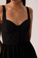 Vestido midi preto com corpo corselet e saia rodada